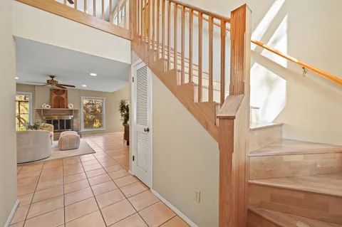 a view of kitchen with furniture and staircase
