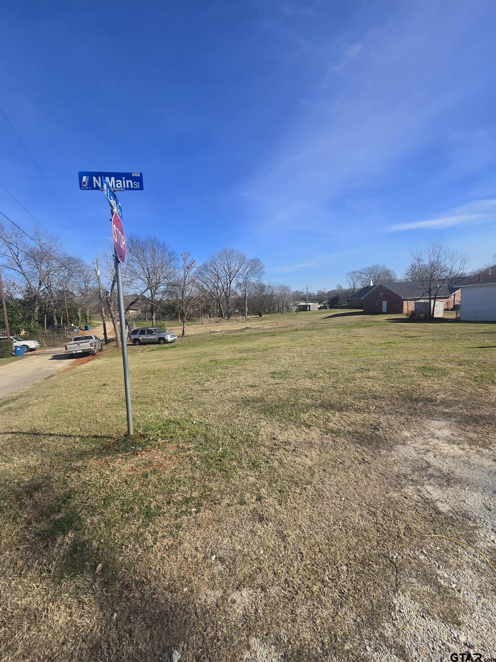 Tbd Ladd Street Jacksonville, TX 75766 - Photo 5 of 6 a house with a yard
