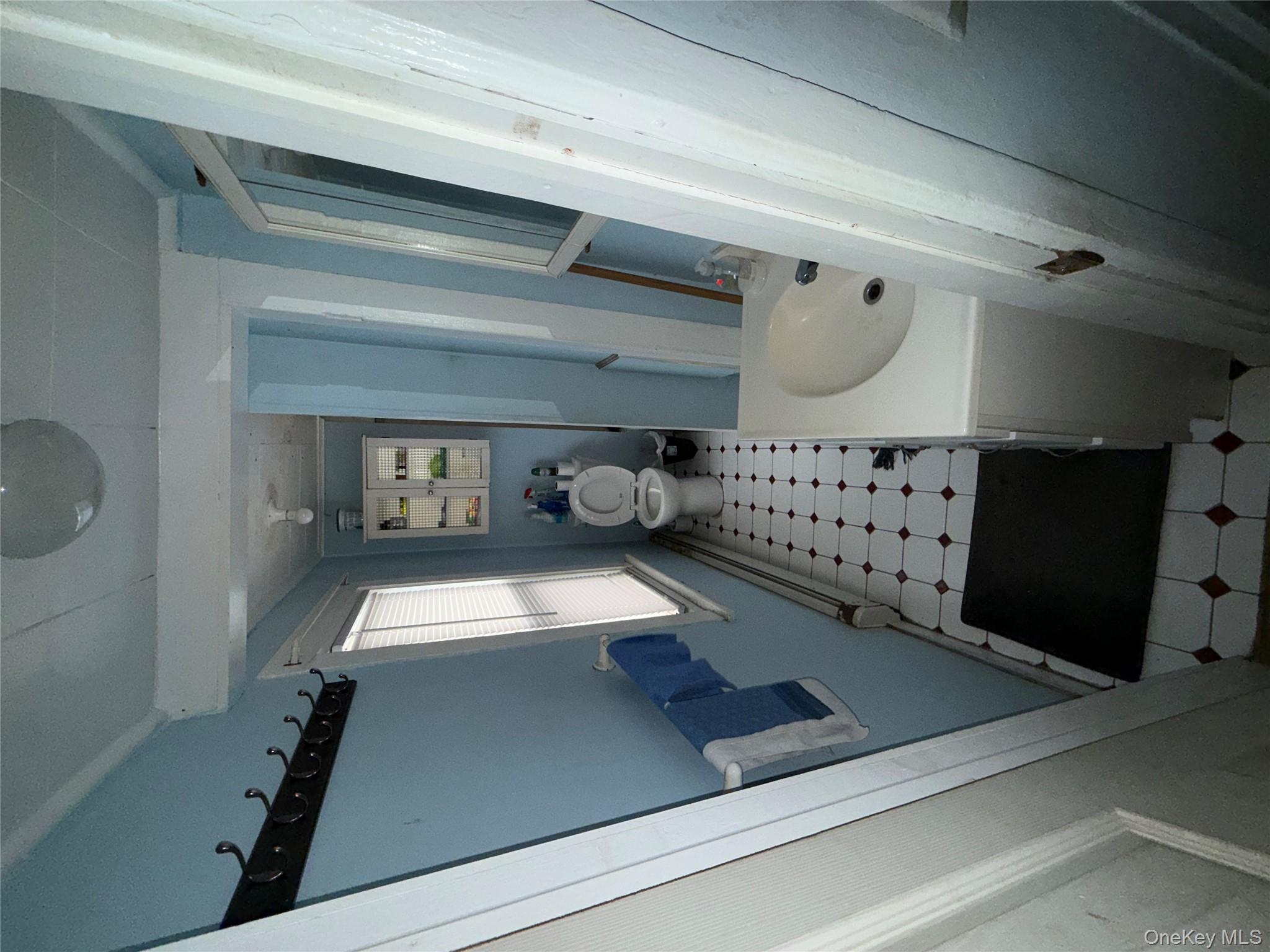 101 North Clinton Street Poughkeepsie, NY 12601 - Photo 8 of 11 Bathroom with light floors and vanity