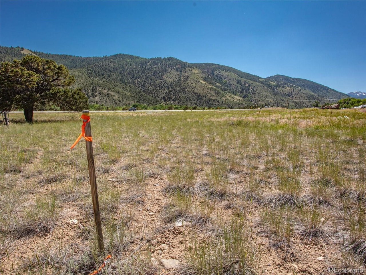 4 Rocky Mountain Road Salida, CO 81201 - Photo 2 of 27 a view of a lake with mountains in the background