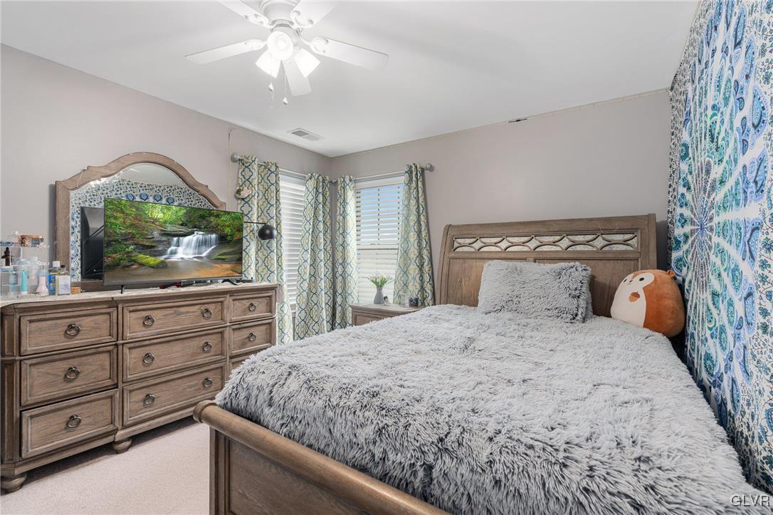 245 East Dell Road Bath, PA 18014 - Photo 39 of 50 a bedroom with a large bed and a large dresser