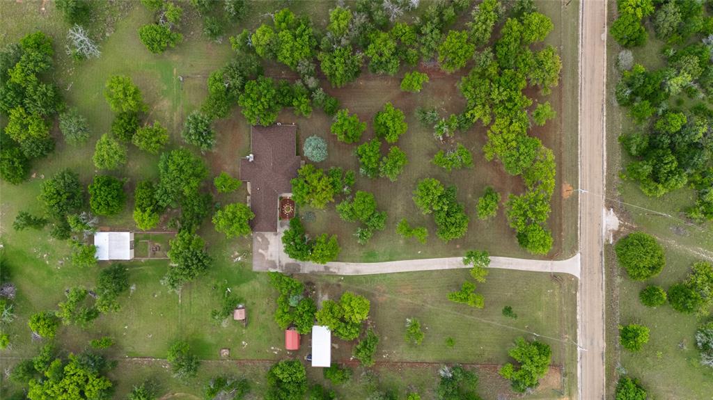 970 Live Oak Road Santo, TX 76472 - Photo 10 of 40 a view of a lake view with a garden