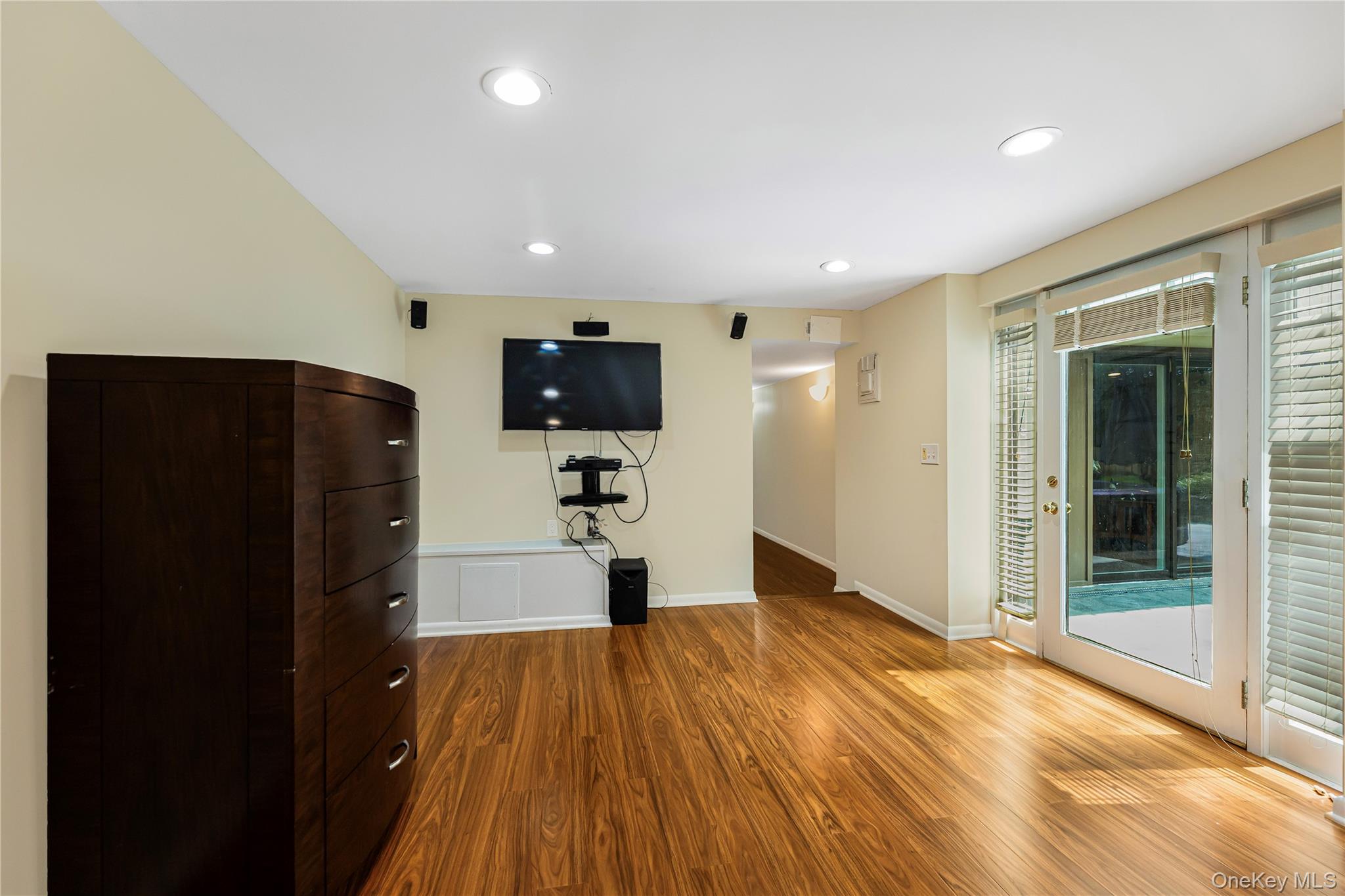 178 Wilmot Road New Rochelle, NY 10804 - Photo 35 of 50 lower-level den/ family room/officew door to patio area