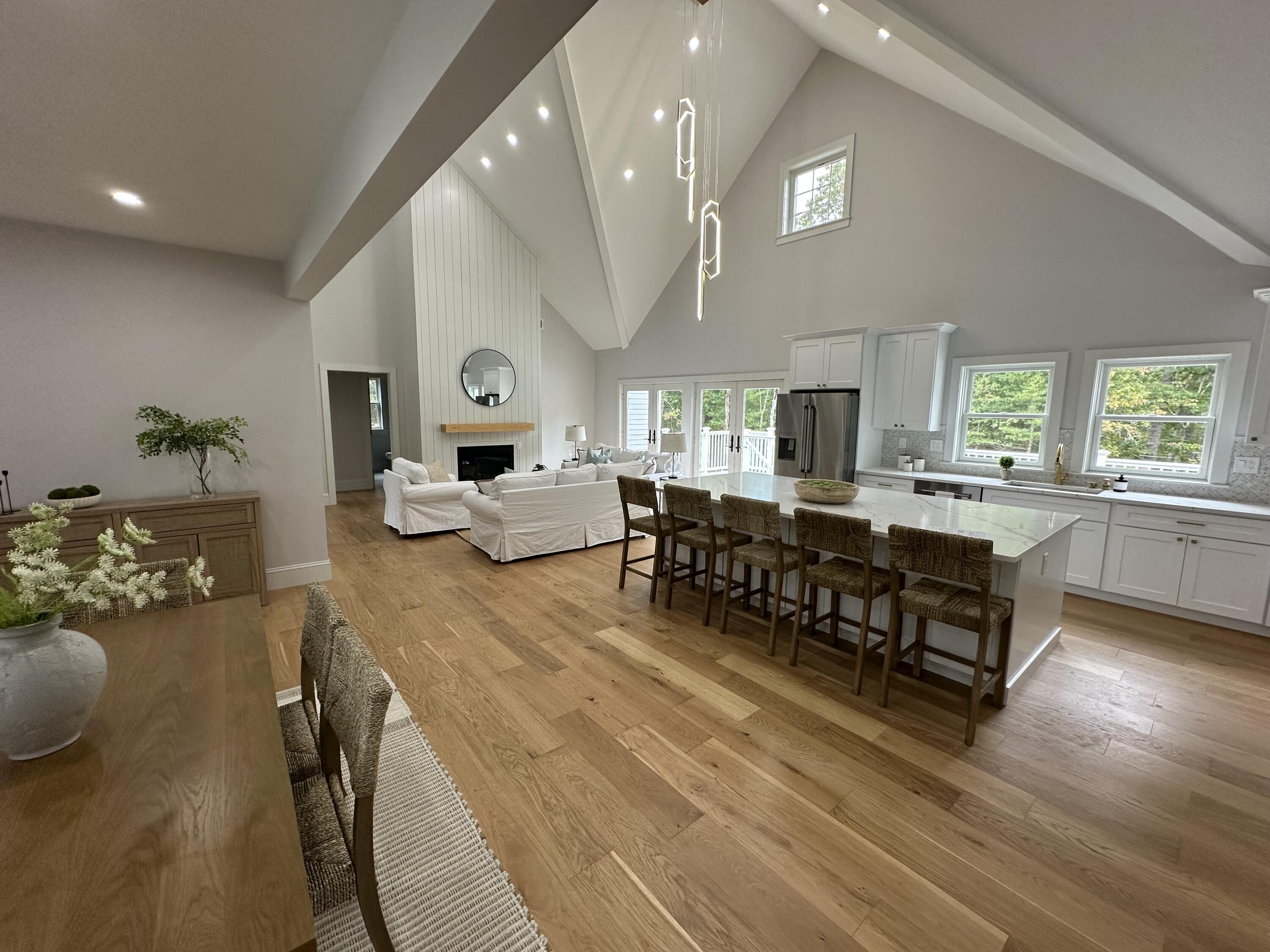 84 Hooppole Road Mashpee, MA 02649 - Photo 11 of 54 a living room with furniture and wooden floor