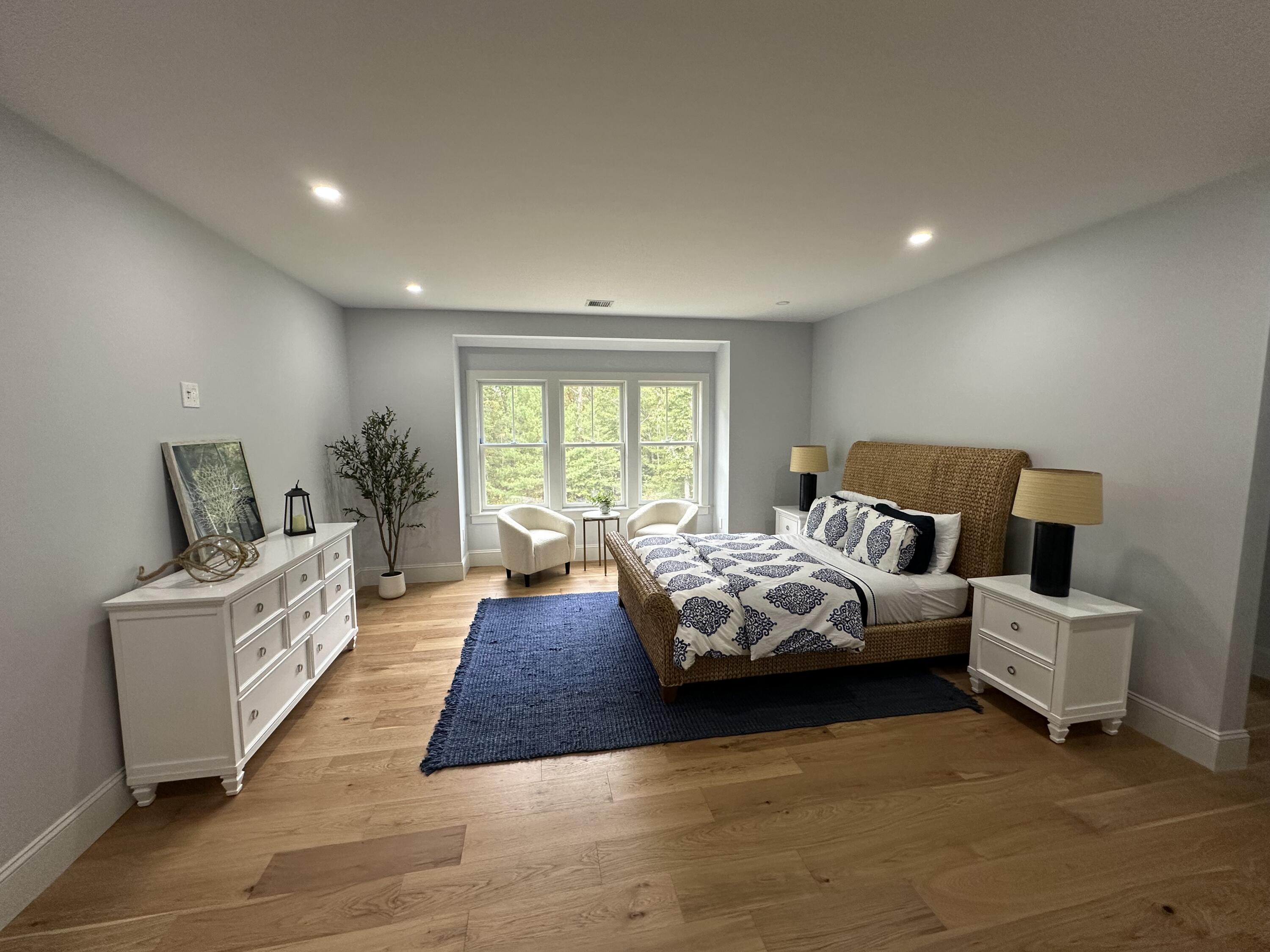 84 Hooppole Road Mashpee, MA 02649 - Photo 26 of 54 a bed room with furniture and a large window