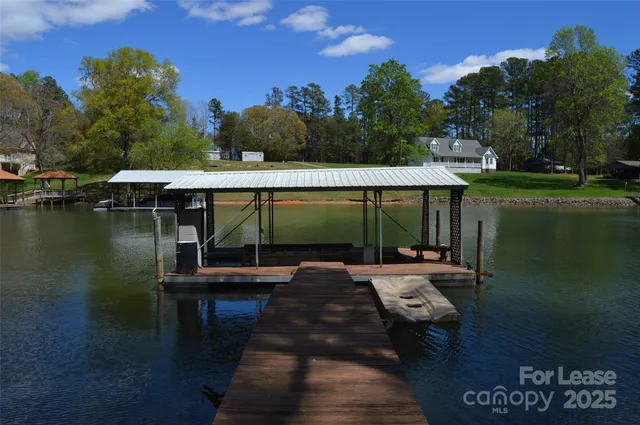 a view of swimming pool with a patio