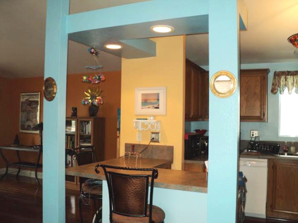 15935 Spring Oaks Road, Unit 112 El Cajon, CA 92021 - Photo 10 of 24 Connecting the kitchen with the living room is this nice L-shaped bar which will seat four people comfortably.