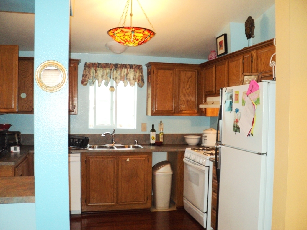 15935 Spring Oaks Road, Unit 112 El Cajon, CA 92021 - Photo 24 of 24 Three or four people could help in the kitchen, with its big square floorplan.