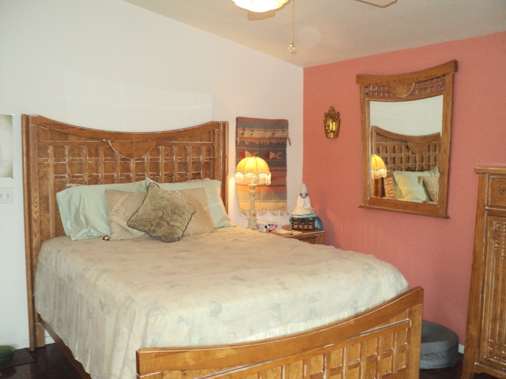 15935 Spring Oaks Road, Unit 112 El Cajon, CA 92021 - Photo 13 of 24 This spacious bedroom is at the back of the house and has its own door to the back yard.