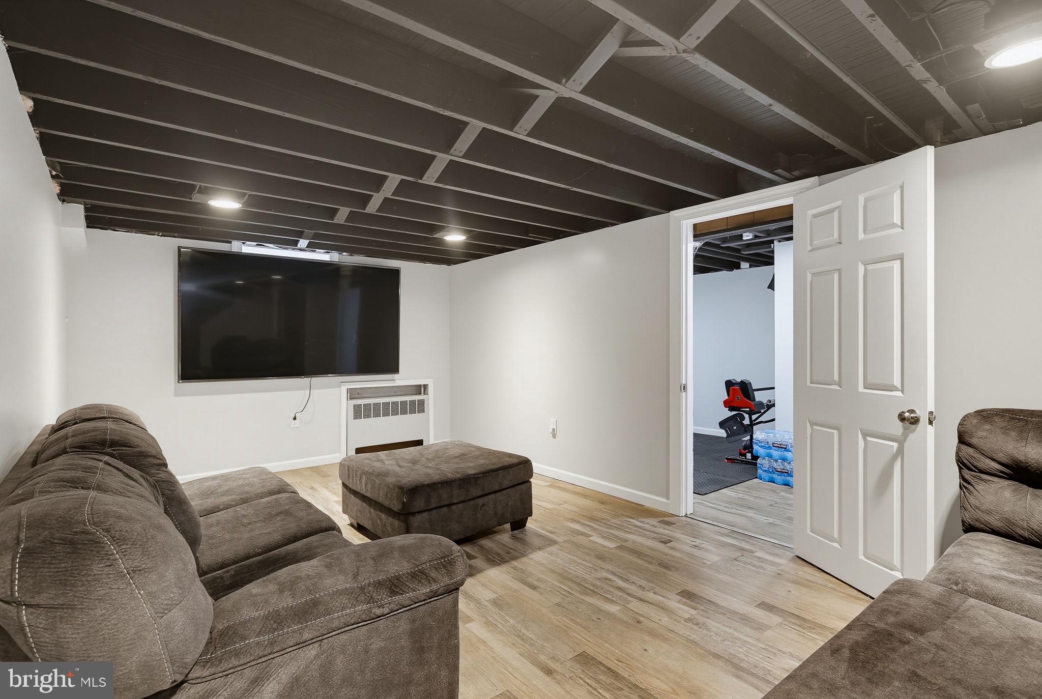 3 Austin Road Reisterstown, MD 21136 - Photo 19 of 37 Cozy basement retreat with modern flair.