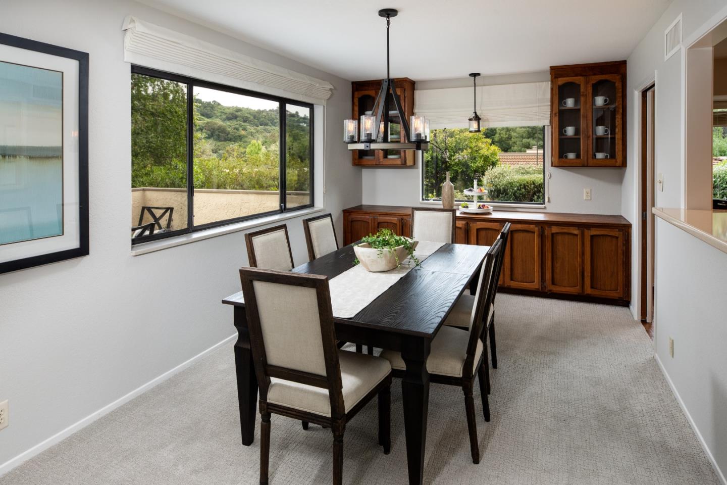 22415 Rancho Deep Cliff Drive Cupertino, CA 95014 - Photo 7 of 33 a view of a dining room with furniture window and outside view