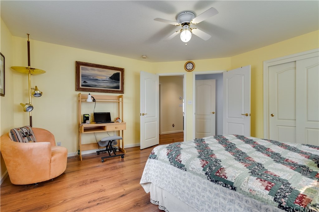 7250 Rancho Verano Place Paso Robles, CA 93446 - Photo 13 of 49 a bedroom with a bed and a couch