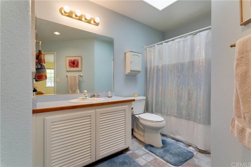 7250 Rancho Verano Place Paso Robles, CA 93446 - Photo 14 of 49 a bathroom with a sink and a toilet