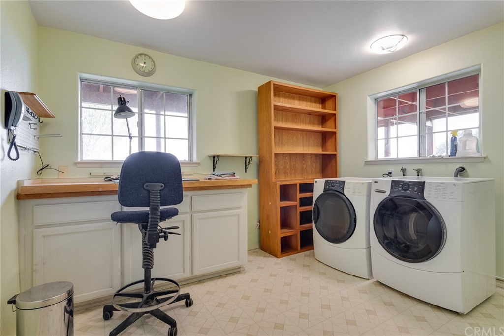 7250 Rancho Verano Place Paso Robles, CA 93446 - Photo 20 of 49 a view of a workspace with furniture and a window
