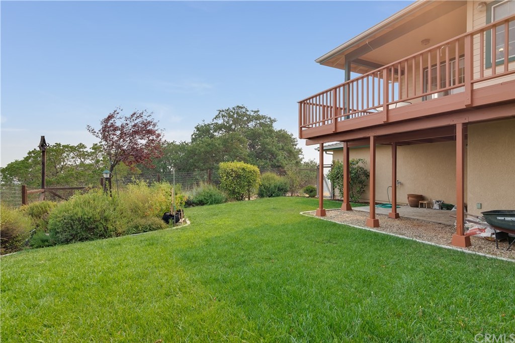7250 Rancho Verano Place Paso Robles, CA 93446 - Photo 24 of 49 a backyard of a house with table and chairs