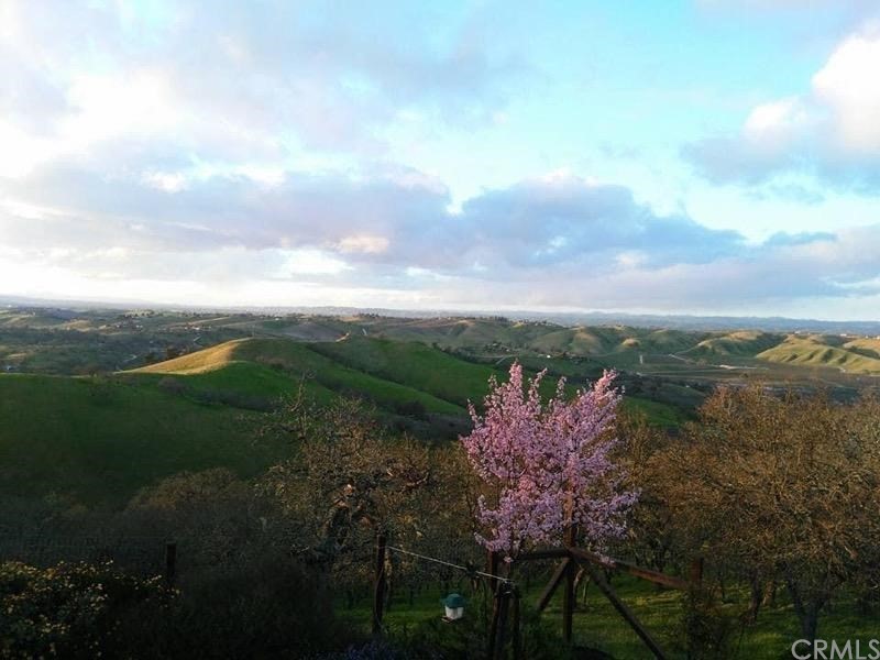 7250 Rancho Verano Place Paso Robles, CA 93446 - Photo 33 of 49 a view of a lake with a mountain in the background