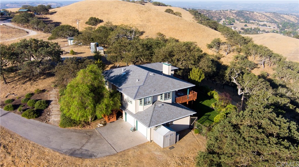 7250 Rancho Verano Place Paso Robles, CA 93446 - Photo 42 of 49 an aerial view of a house with a yard and lake view