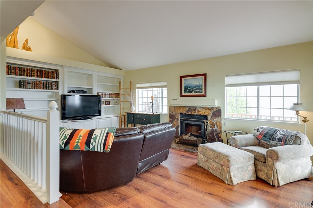 7250 Rancho Verano Place Paso Robles, CA 93446 - Photo 6 of 49 a living room with furniture and a fireplace