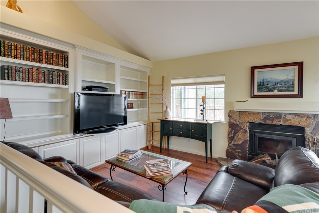 7250 Rancho Verano Place Paso Robles, CA 93446 - Photo 7 of 49 a living room with furniture and a flat screen tv