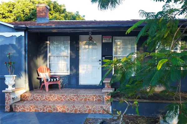 a view of house with outdoor space