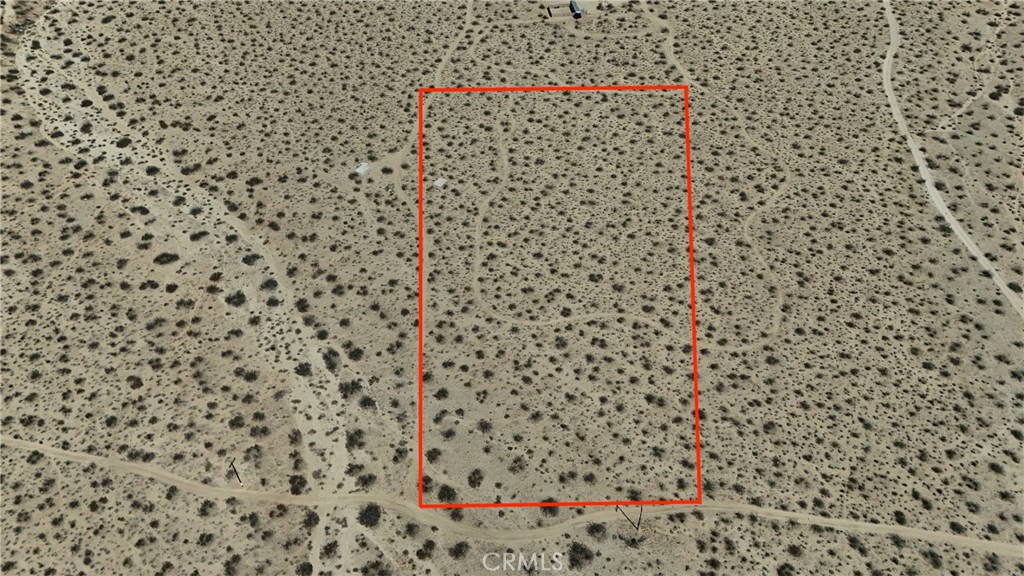 774 Manzanita Road Landers, CA 92285 - Photo 1 of 16 a bathroom with a shower curtain