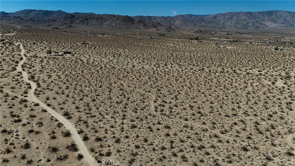 774 Manzanita Road Landers, CA 92285 - Photo 11 of 16 a view of a bathroom with a shower