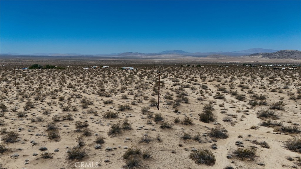 774 Manzanita Road Landers, CA 92285 - Photo 7 of 16 a view of a yard