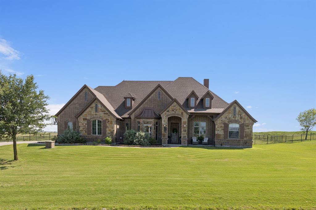 6824 Katie Corral Drive Fort Worth, TX 76126 - Photo 2 of 39 a front view of a house with a garden and bathtub