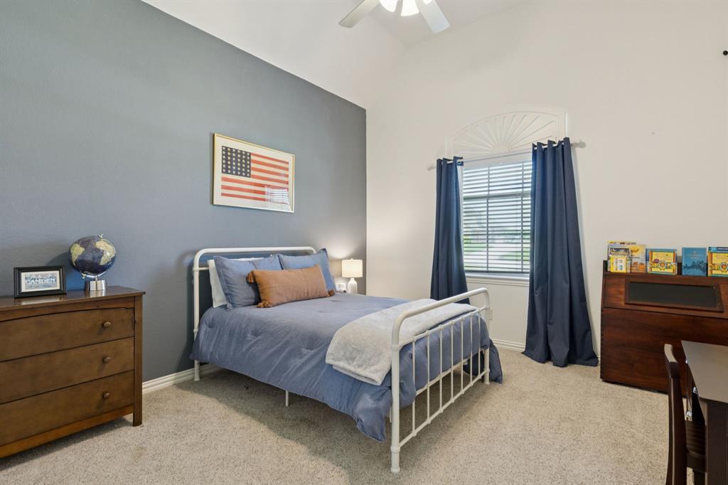 6824 Katie Corral Drive Fort Worth, TX 76126 - Photo 22 of 39 a bedroom with a bed and a dresser