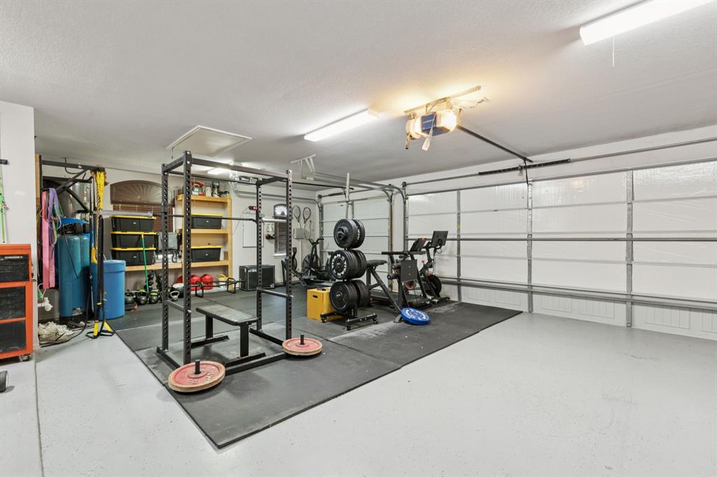 6824 Katie Corral Drive Fort Worth, TX 76126 - Photo 27 of 39 a view of a room with gym equipment
