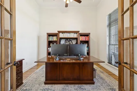 a room with furniture and wooden floor