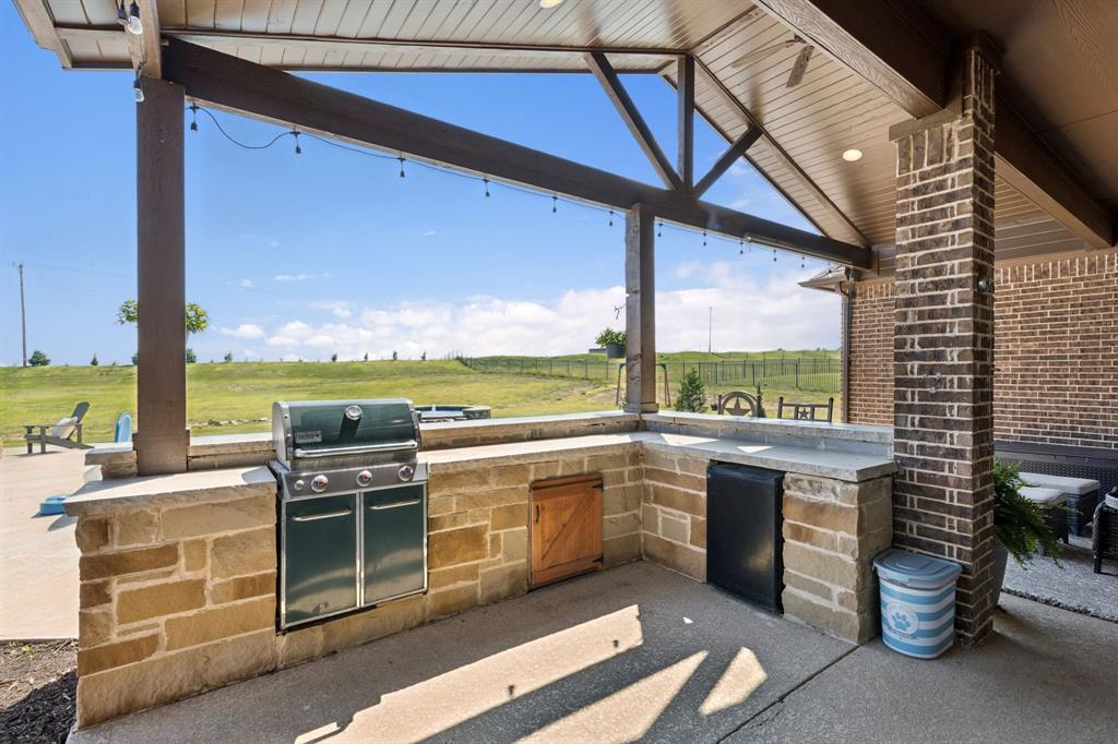 6824 Katie Corral Drive Fort Worth, TX 76126 - Photo 31 of 39 a view of a chairs and table in the balcony