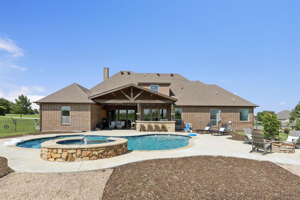 6824 Katie Corral Drive Fort Worth, TX 76126 - Photo 37 of 39 a front view of a house with a yard