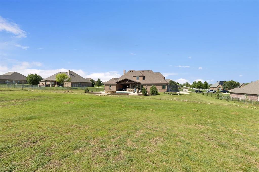 6824 Katie Corral Drive Fort Worth, TX 76126 - Photo 39 of 39 a front view of a house with yard
