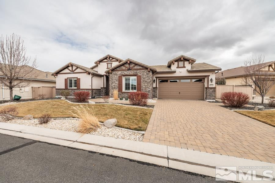 2210 Trakehner Lane Reno, NV 89521 - Photo 1 of 39 a front view of a house with a yard