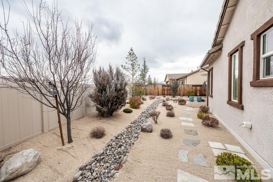 2210 Trakehner Lane Reno, NV 89521 - Photo 31 of 39 a view of a yard covered in snow