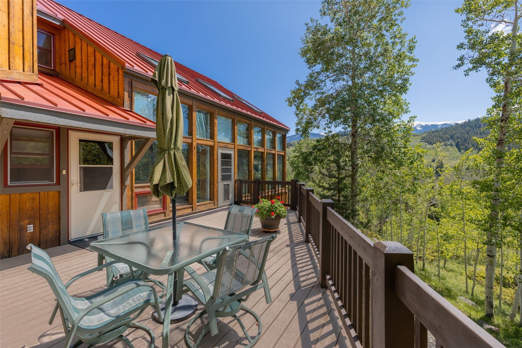 1516 Blue Ridge Road Silverthorne, CO 80498 - Photo 30 of 50 Wooden terrace with outdoor dining space
