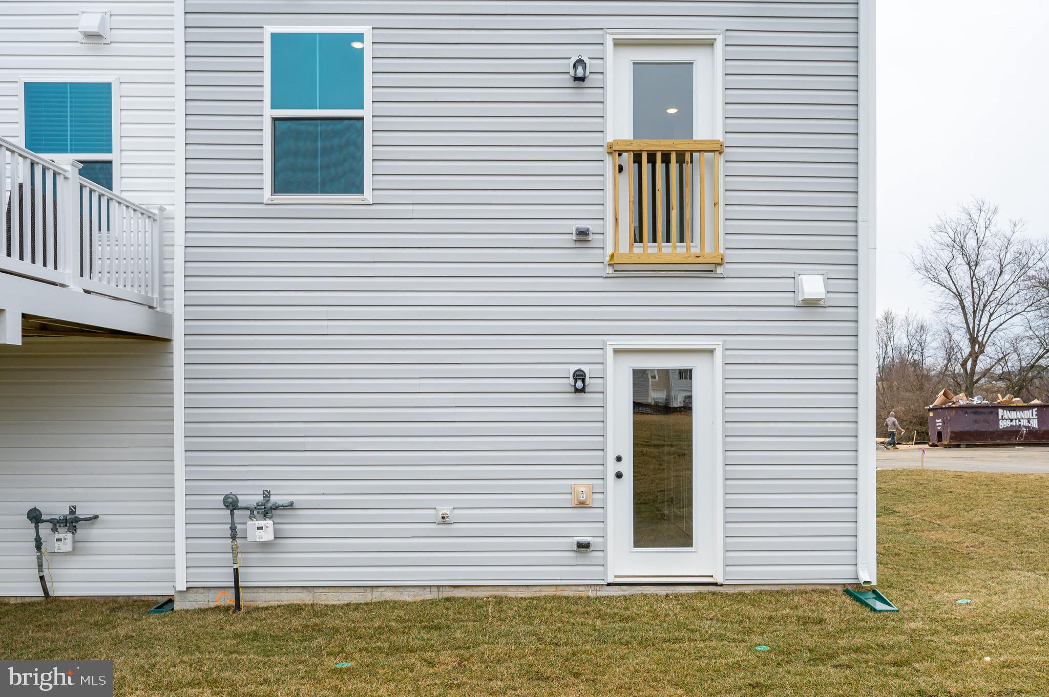 164 Rabbit Road Hedgesville, WV 25427 - Photo 12 of 41 a front view of a house with a garage