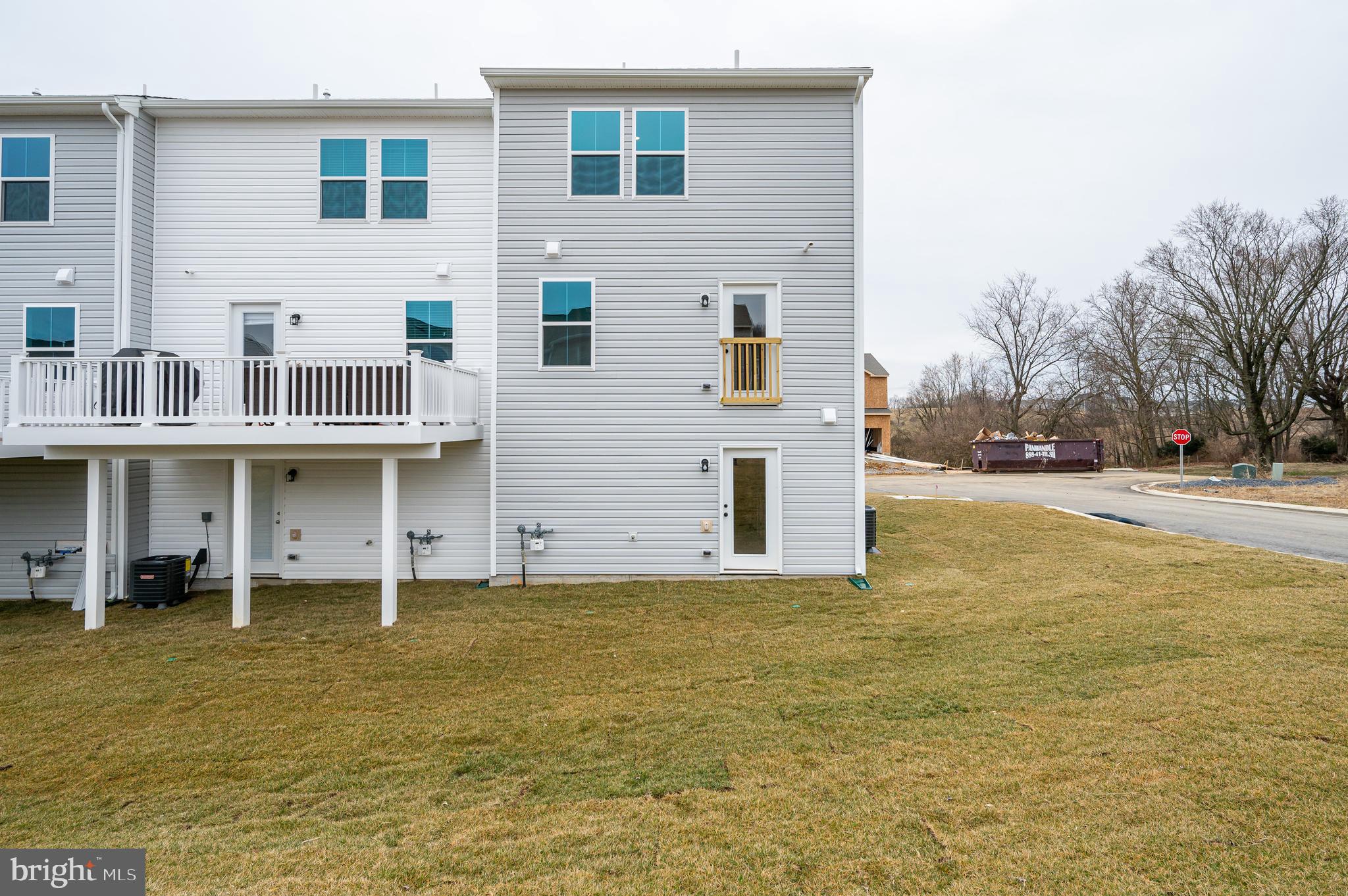 164 Rabbit Road Hedgesville, WV 25427 - Photo 8 of 41 a view of a building with many windows