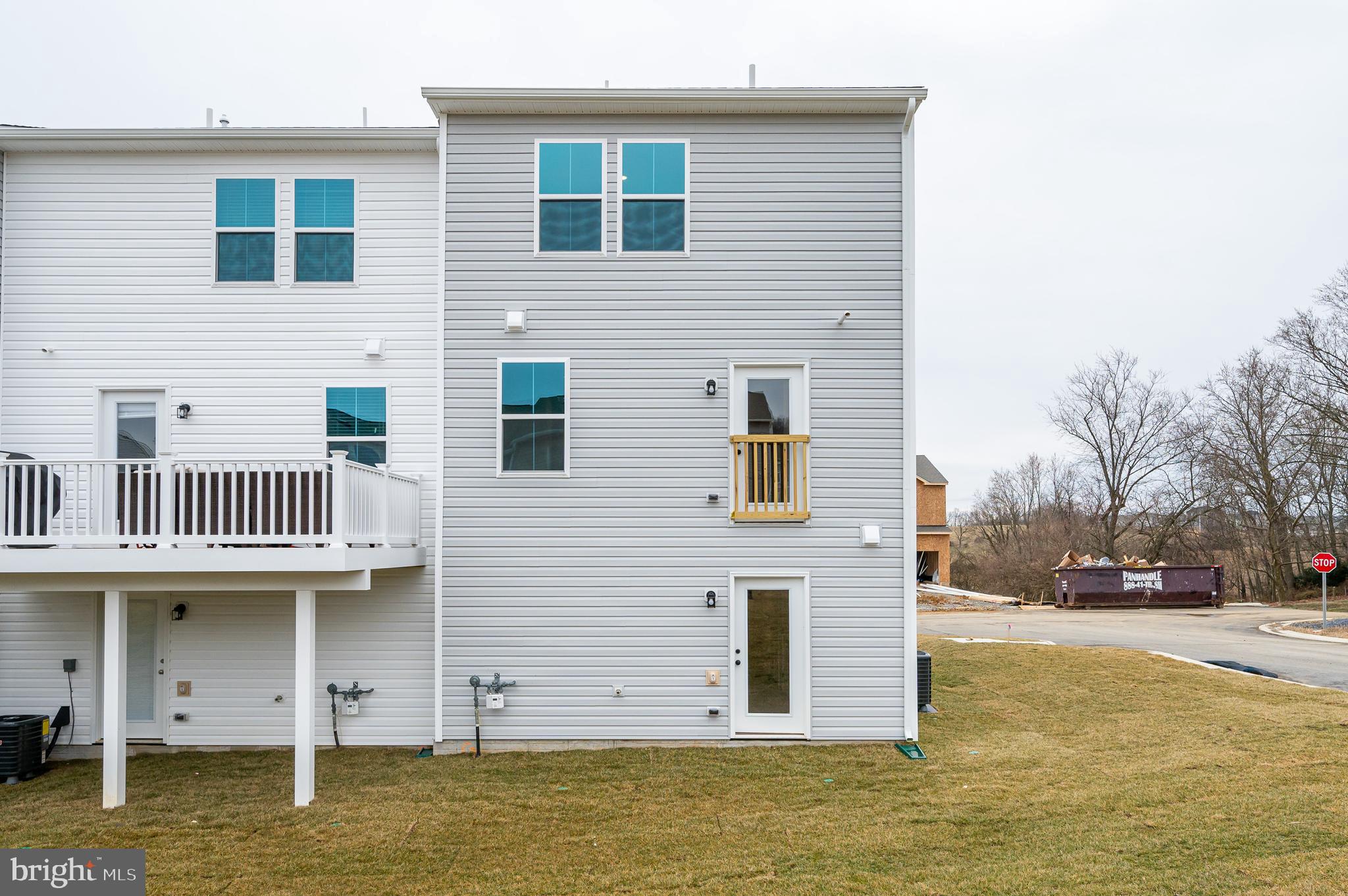 164 Rabbit Road Hedgesville, WV 25427 - Photo 9 of 41 a view of a patio with a table and chairs