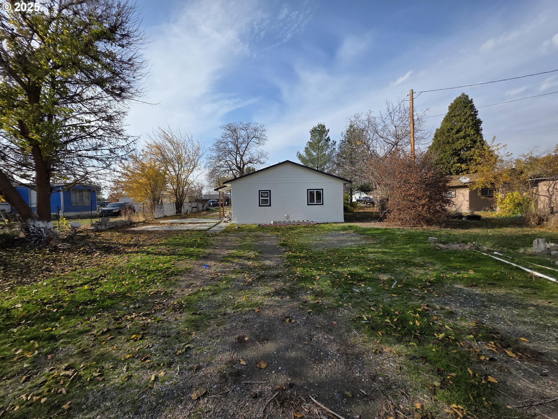 310 4th Street Northeast Irrigon, OR 97844 - Photo 13 of 13 a view of a house with backyard and garden