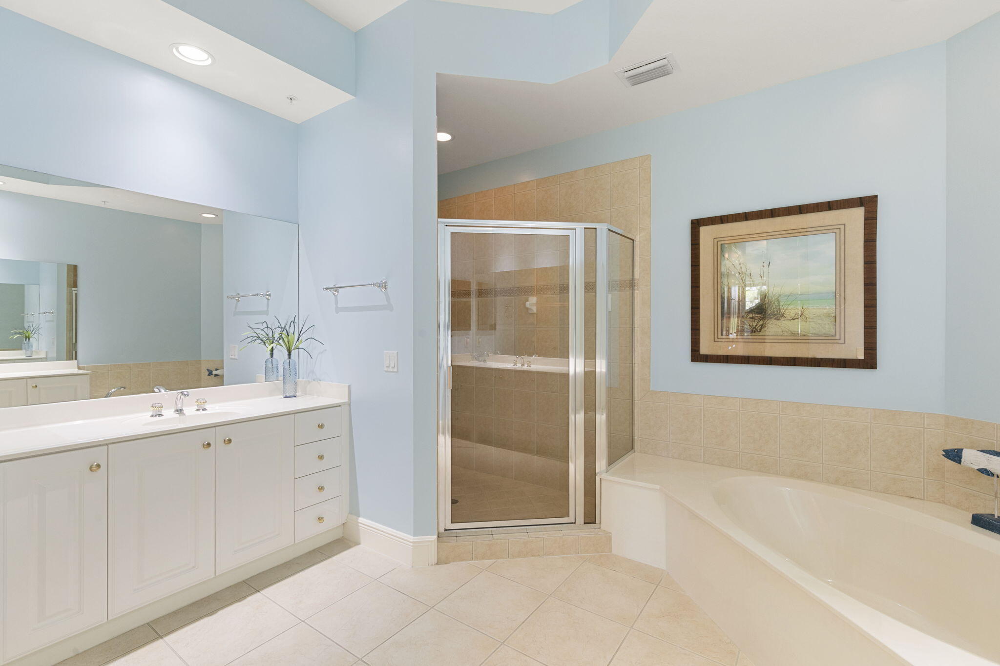 9066 Cascada Way, Unit 101 Naples, FL 34114 - Photo 20 of 51 a bathroom with a bathtub and a sink