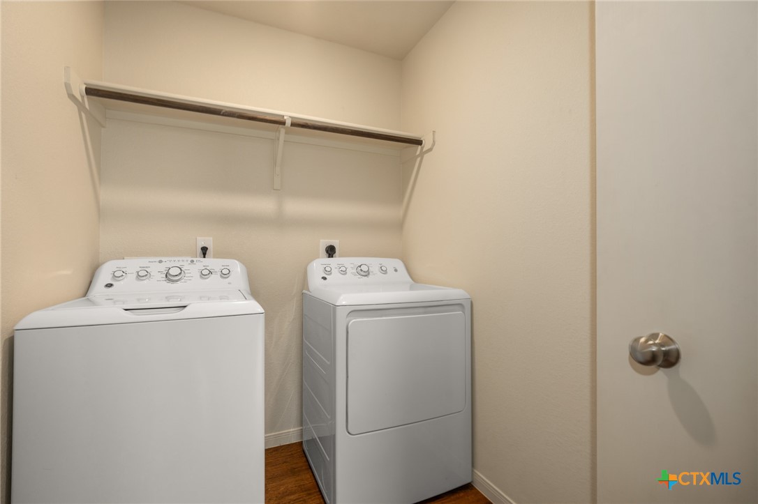 5701 Rustler Drive, Unit B Killeen, TX 76543 - Photo 16 of 29 a utility room with dryer and washer