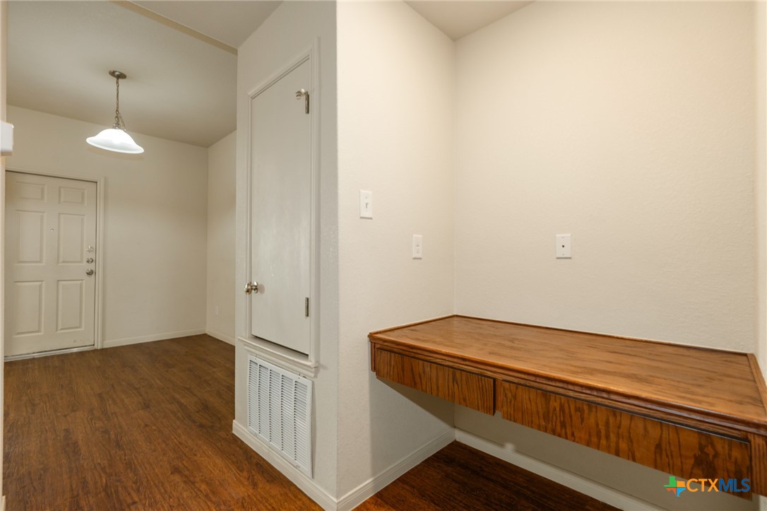 5701 Rustler Drive, Unit B Killeen, TX 76543 - Photo 10 of 29 a view of empty room with wooden floor