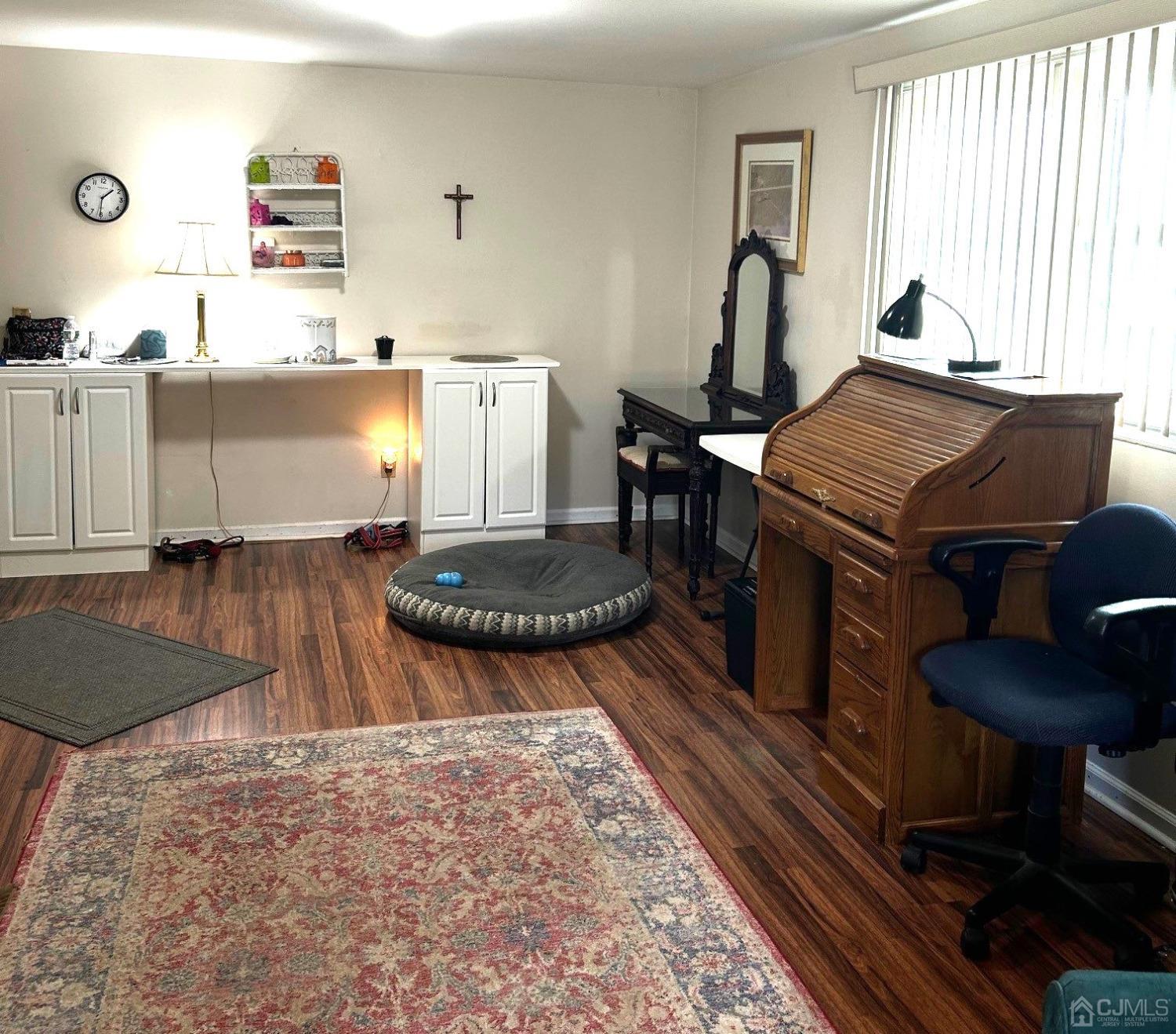 327 New Market Road Dunellen, NJ 08812 - Photo 10 of 13 a living room with furniture and a table
