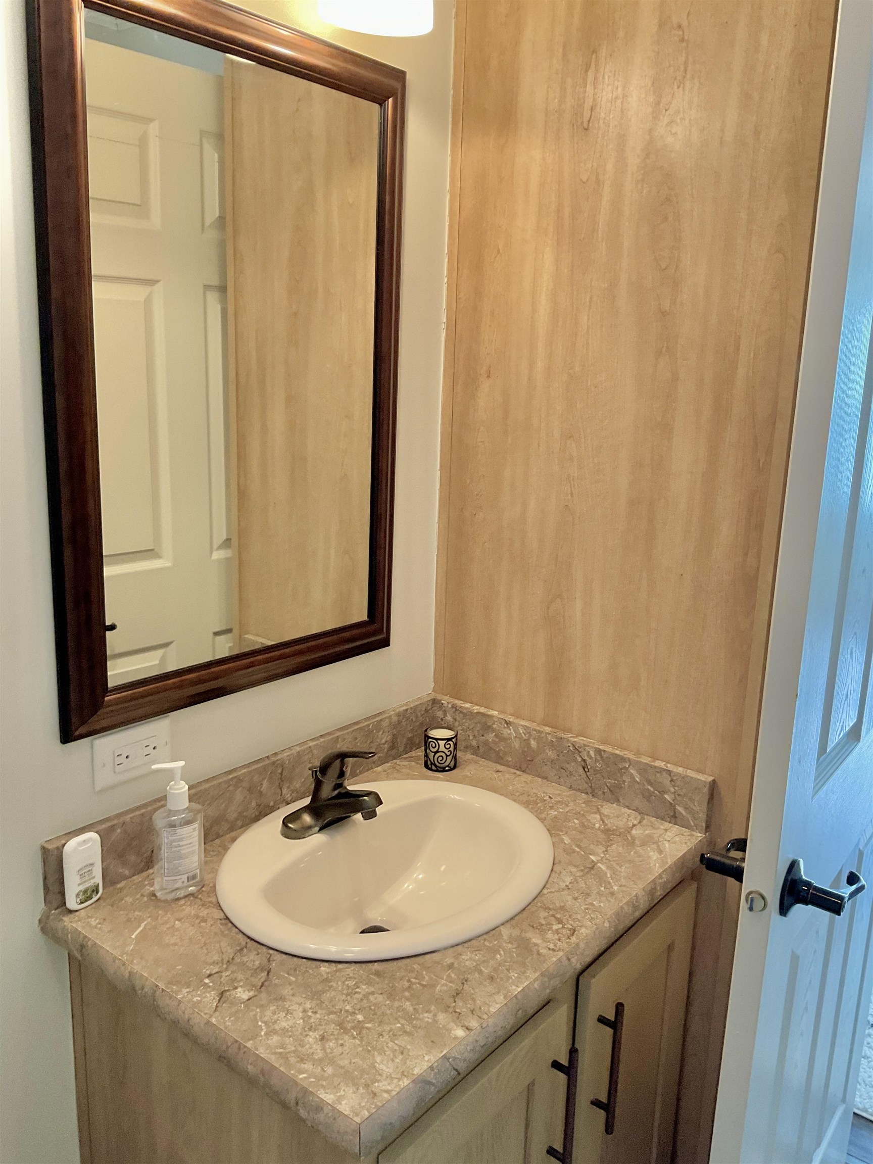 2058 Shore Road Seaville, NJ 08230 - Photo 27 of 36 a bathroom with a granite countertop sink and a mirror