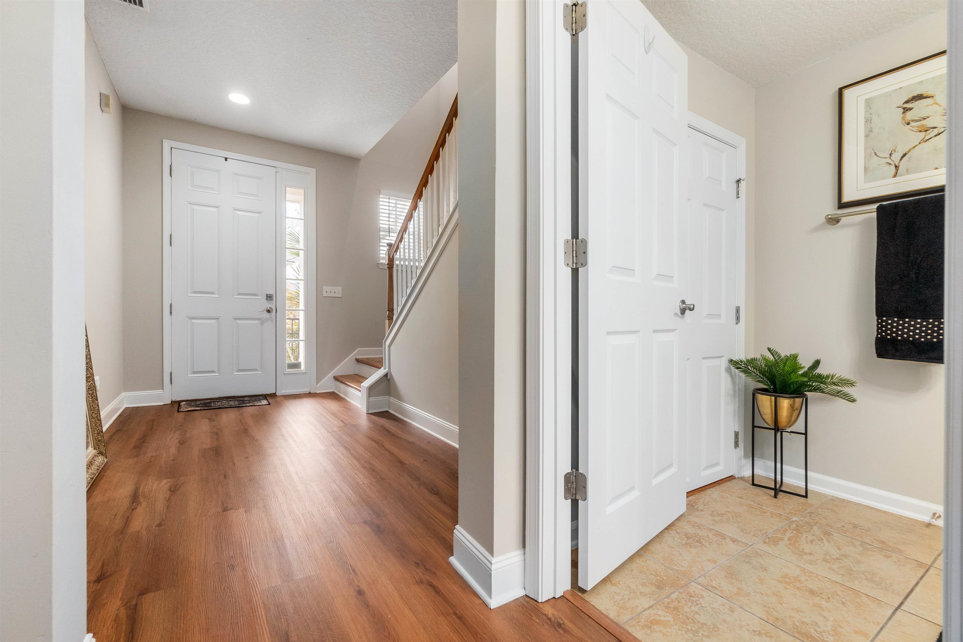 18 Amistad Drive St. Augustine, FL 32086 - Photo 4 of 37 a view of an entryway with wooden floor