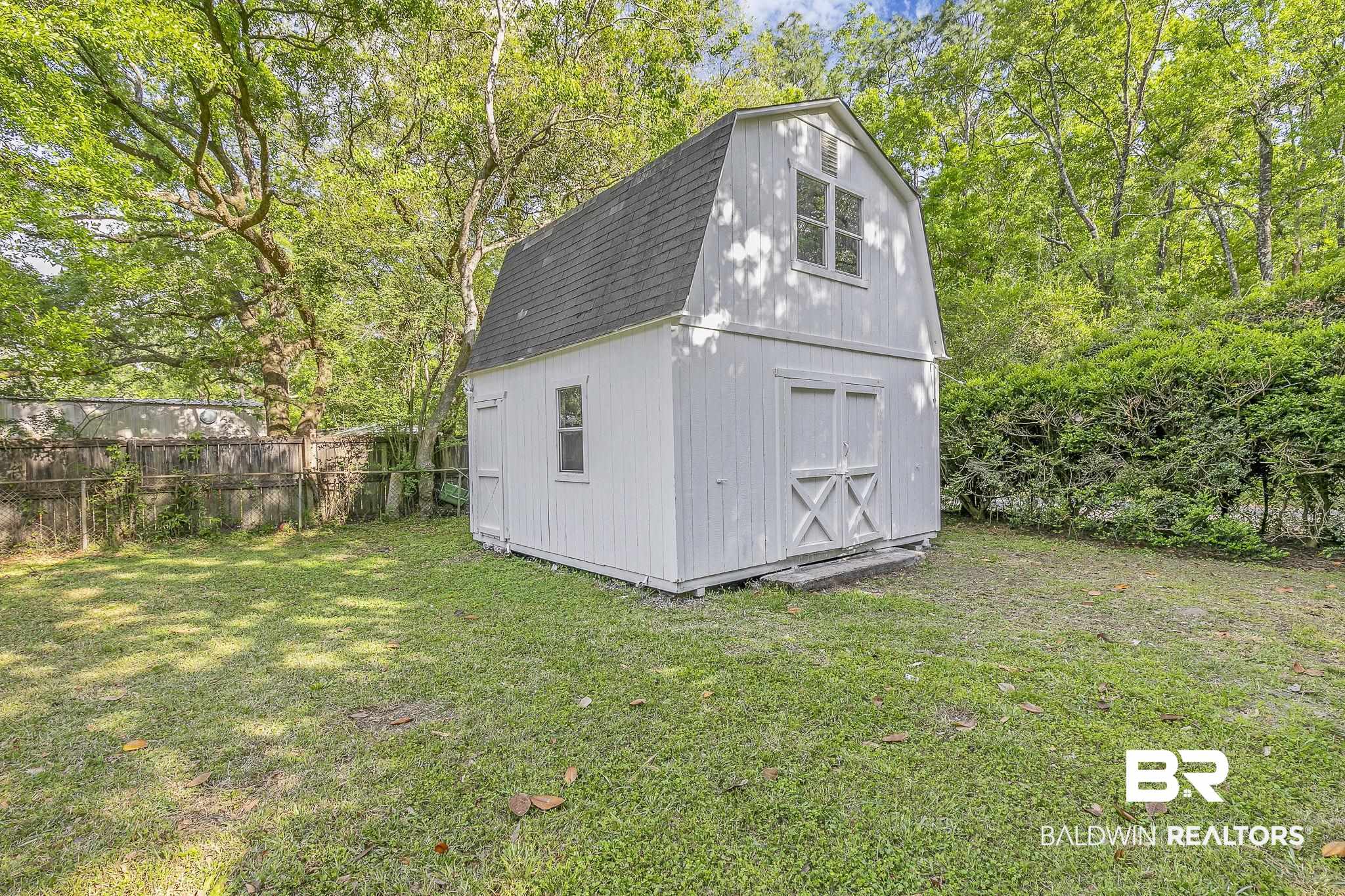 203 Anderson Road Saraland, AL 36571 - Photo 39 of 48 View of shed featuring fence