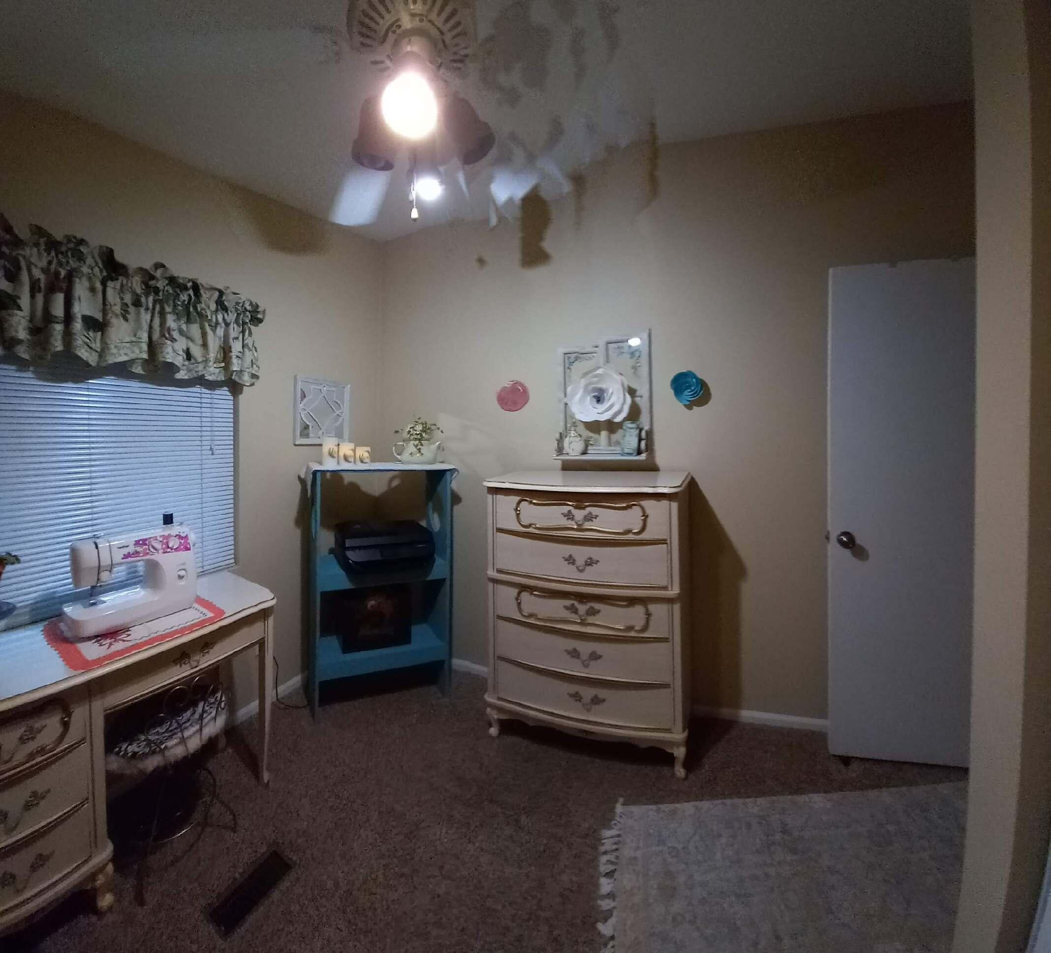 4696 Maple Trail, Unit LOS ROBLES ESTATES Redding, CA 96003 - Photo 21 of 33 a view of room with furniture and window