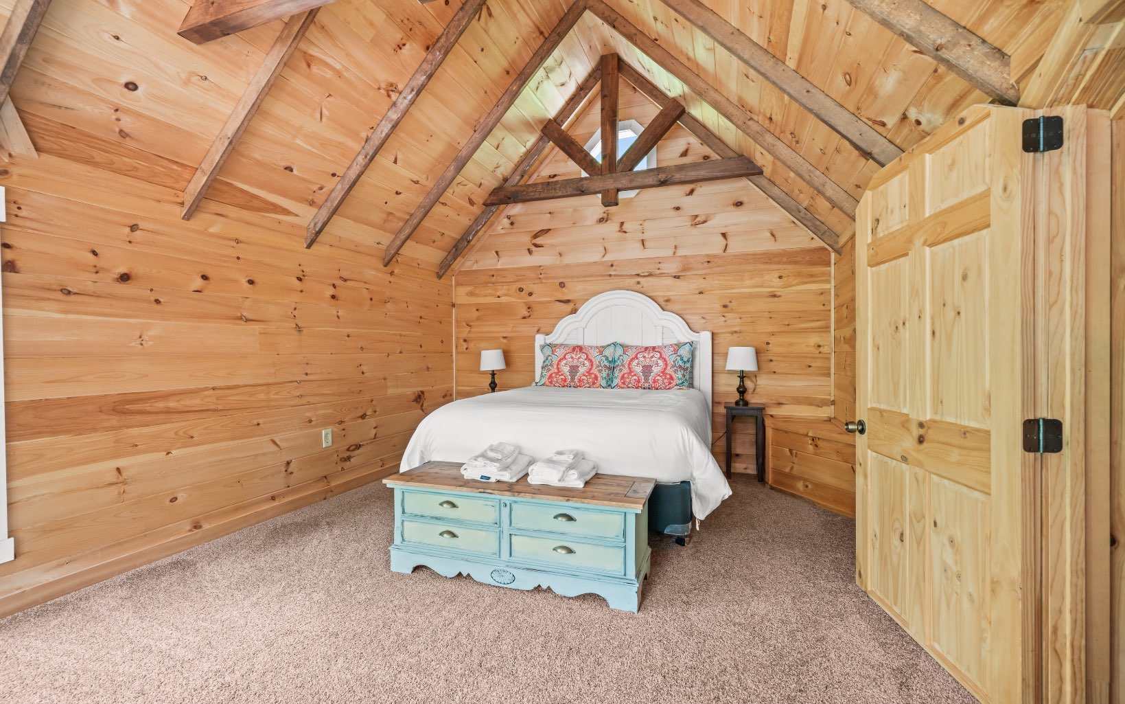 285 Shallowford Bridge Lane Blue Ridge, GA 30513 - Photo 30 of 66 a spacious bedroom with a bed and a table